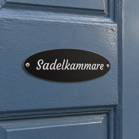 Skylt till sadelkammare i stall